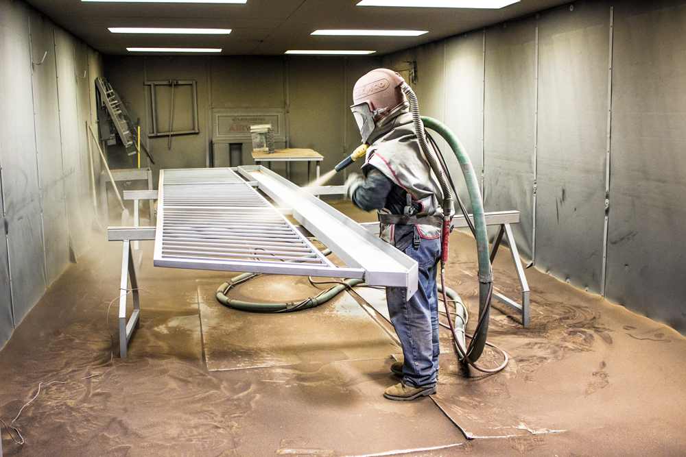 Sand blasting a large item